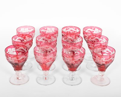 Lot 500 - A suite of cranberry stained glassware