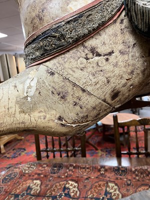 Lot 679 - An early carved and painted rocking horse