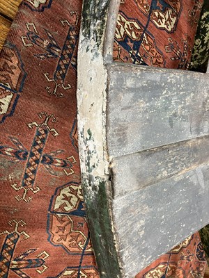 Lot 679 - An early carved and painted rocking horse