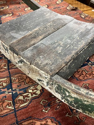 Lot 679 - An early carved and painted rocking horse