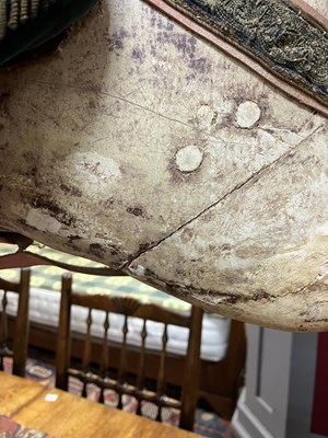 Lot 679 - An early carved and painted rocking horse