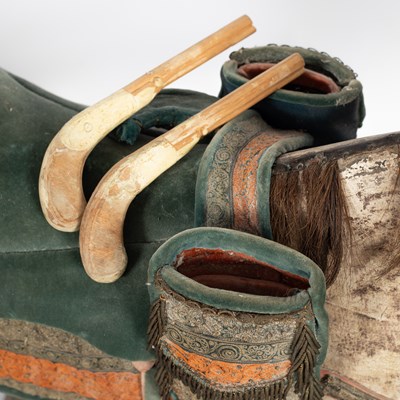 Lot 679 - An early carved and painted rocking horse