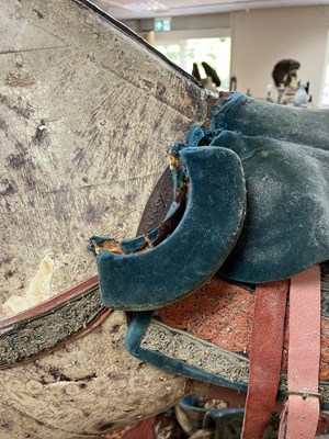 Lot 679 - An early carved and painted rocking horse