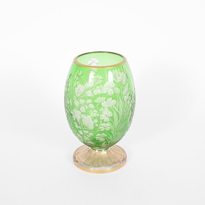 Lot 504 - A Bohemian green stained oviform vase