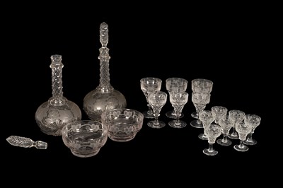 Lot 506 - A pair of vine engraved onion-shaped decanters