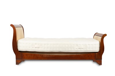 Lot 699 - A French Empire style lit-en-bateau