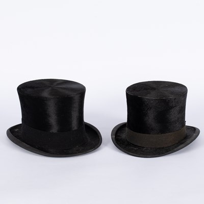 Lot 728 - A black silk top hat