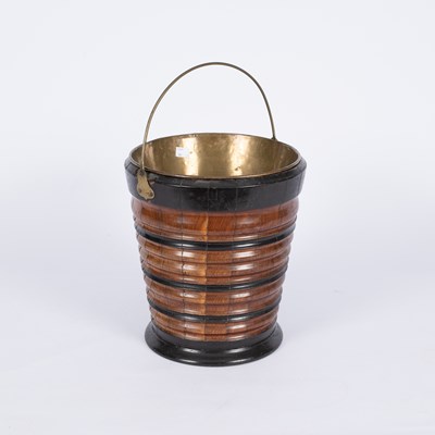 Lot 731 - A Dutch walnut and ebonised bucket