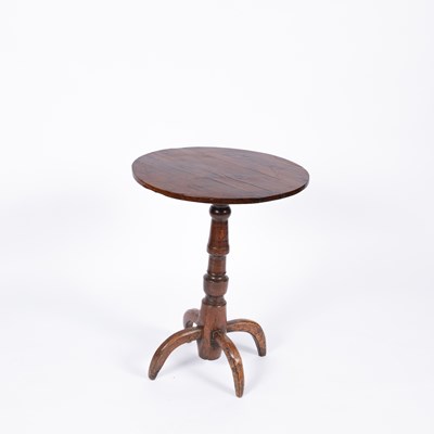 Lot 734 - A country made yew wood tripod table