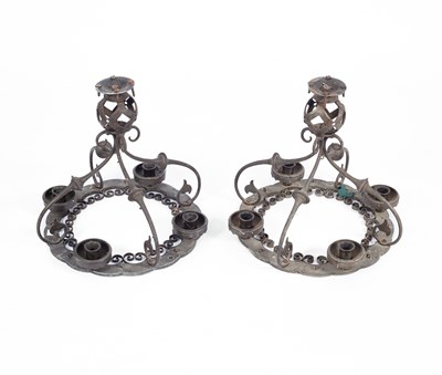 Lot 54 - A pair of iron corona chandeliers
