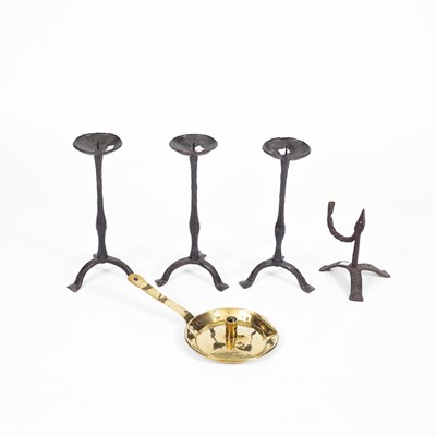 Lot 62 - Three iron pricket candlesticks