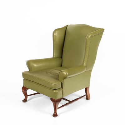 Lot 218 - An 18th Century style wingback armchair