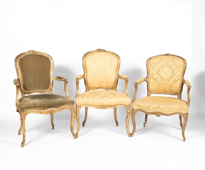 Lot 199 - A near pair of gilt-framed open armchairs