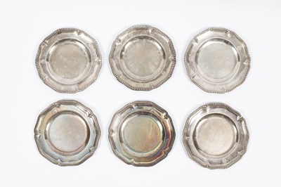 Lot A set of six George III silver plates