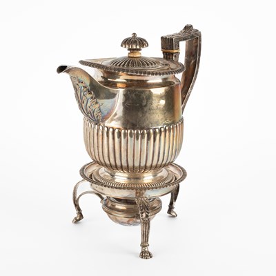 Lot A George III silver hot water jug and stand
