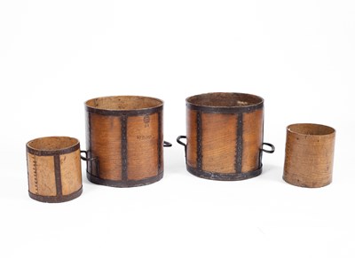 Lot 56 - Four iron bound wooden bushel measures