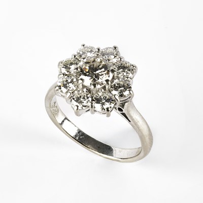 Lot An 18ct white gold and diamond cluster ring