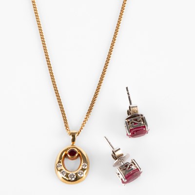 Lot 229 - An 18k yellow gold ruby and diamond pendant