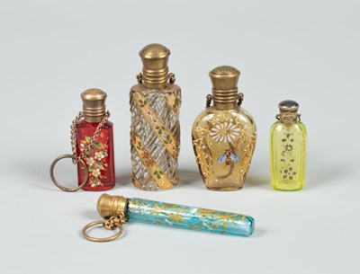 Lot 379 - Four coloured glass scent bottles enamelled with flowers