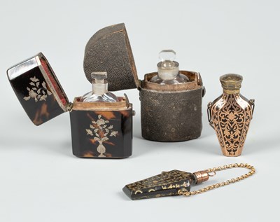 Lot 386 - A tortoiseshell piqué inlaid flattened tapering scent bottle