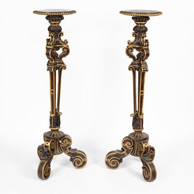 Lot 772 - A pair of 17th Century style parcel-gilt and faux rosewood torchères