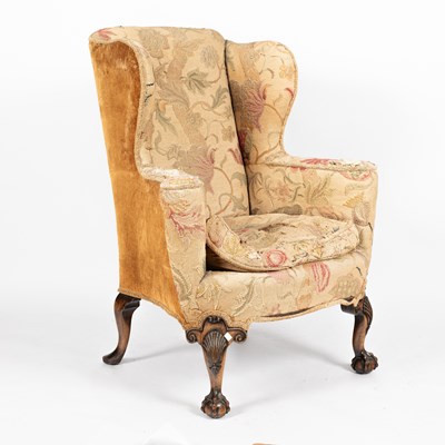 Lot 775 - A George III style walnut framed wing armchair