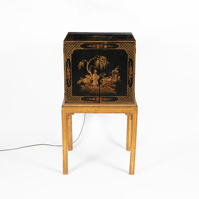 Lot 779 - An 18th Century style black japanned cabinet on stand