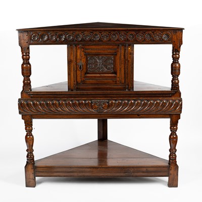 Lot 780 - A 17th Century style oak corner buffet