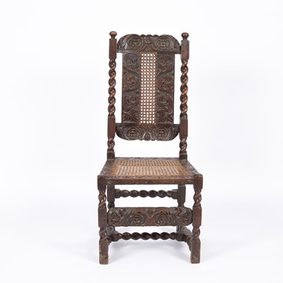 Lot 787 - A Charles II carved walnut framed chair