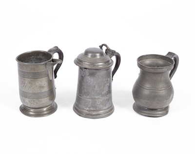 Lot 80 - A lidded pewter tankard