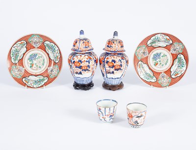 Lot 185 - A pair of Japanese Imari vases and covers