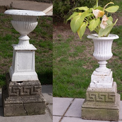 Lot 720 - Two cast iron campana-shaped jardinières