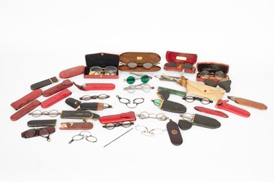 Lot 852 - A quantity of early spectacles, reading glasses and cases