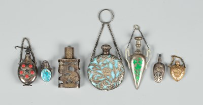 Lot 403 - Four Continental white metal mounted scent bottles