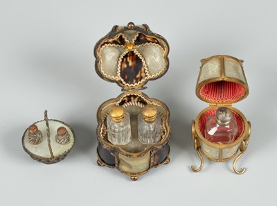 Lot 410 - A novelty scent bottle holder