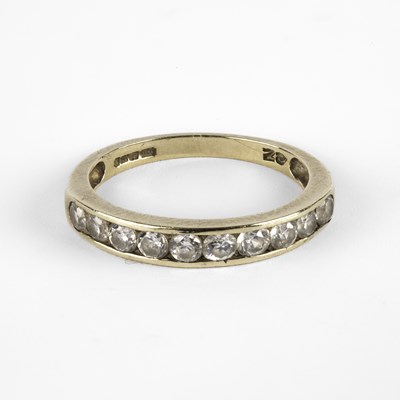 Lot 240 - A 9ct gold and diamond eternity ring