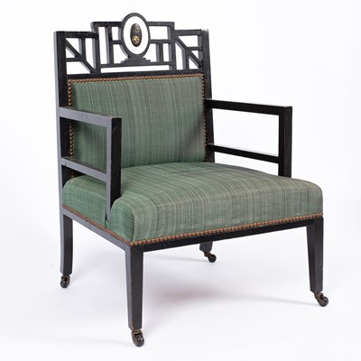 Lot 50 - An Aesthetic movement ebonised open armchair
