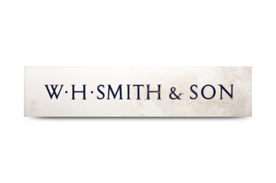 Lot 23 - A large acrylic W H Smith & Son wall sign