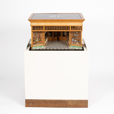 Lot 30 - A late 19th Century oak and painted model of a W. H. Smith high street store