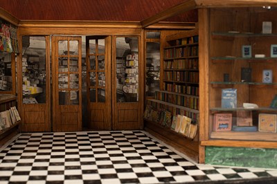 Lot 30 - A late 19th Century oak and painted model of a W. H. Smith high street store