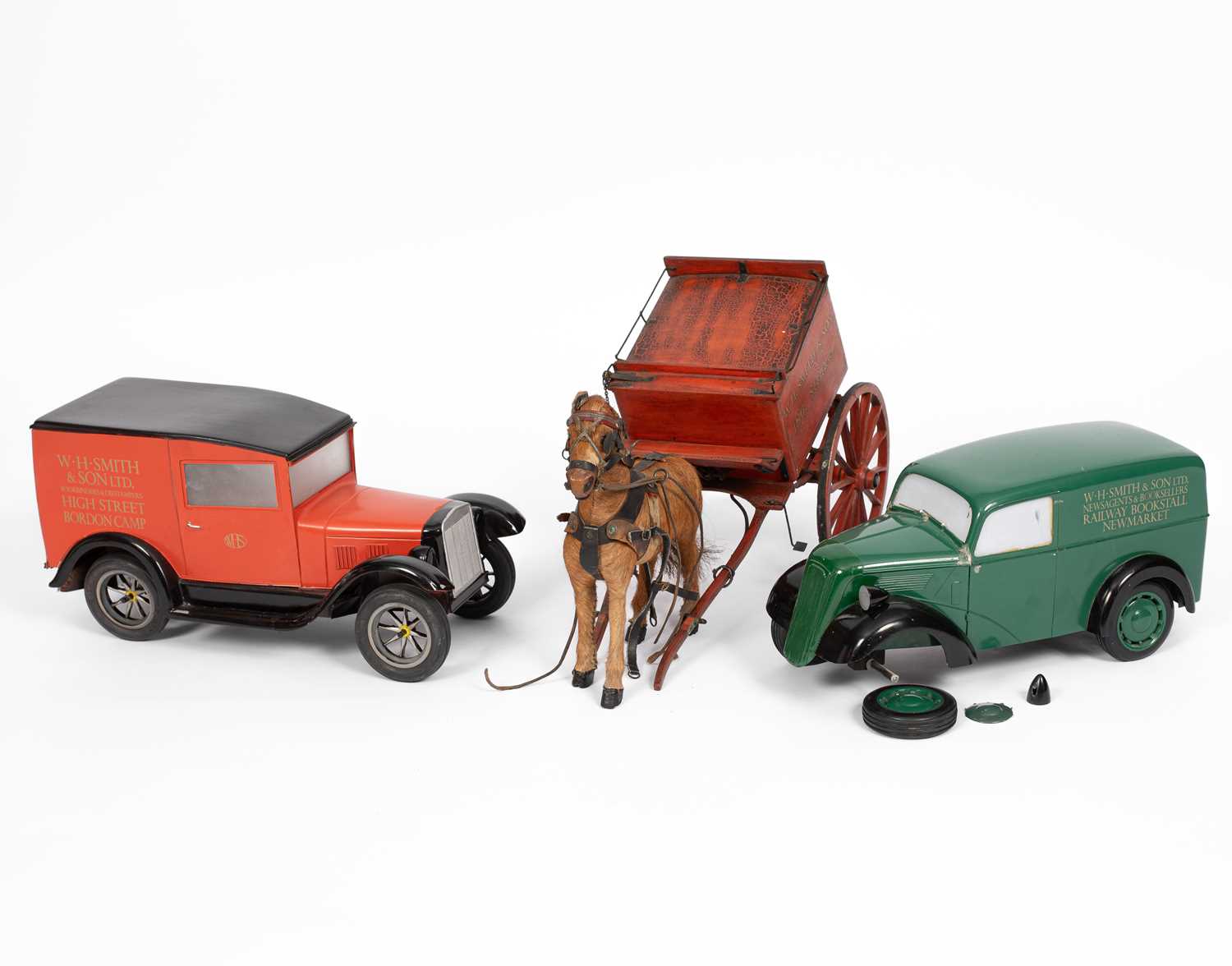 Lot 34 - A model of a W. H. Smith & Son branded horse drawn cart