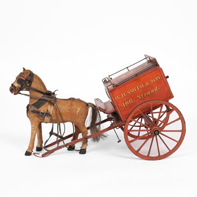 Lot 34 - A model of a W. H. Smith & Son branded horse drawn cart