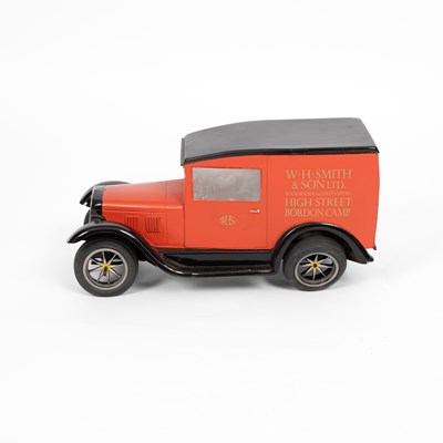 Lot 34 - A model of a W. H. Smith & Son branded horse drawn cart