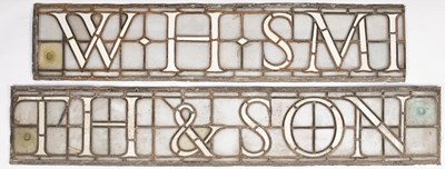 Lot 63 - A large leaded glass W. H. Smith & Son shop sign