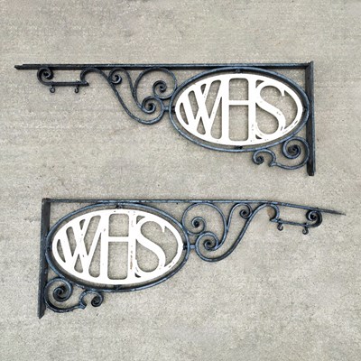Lot 46 - A pair of large black painted wrought iron brackets