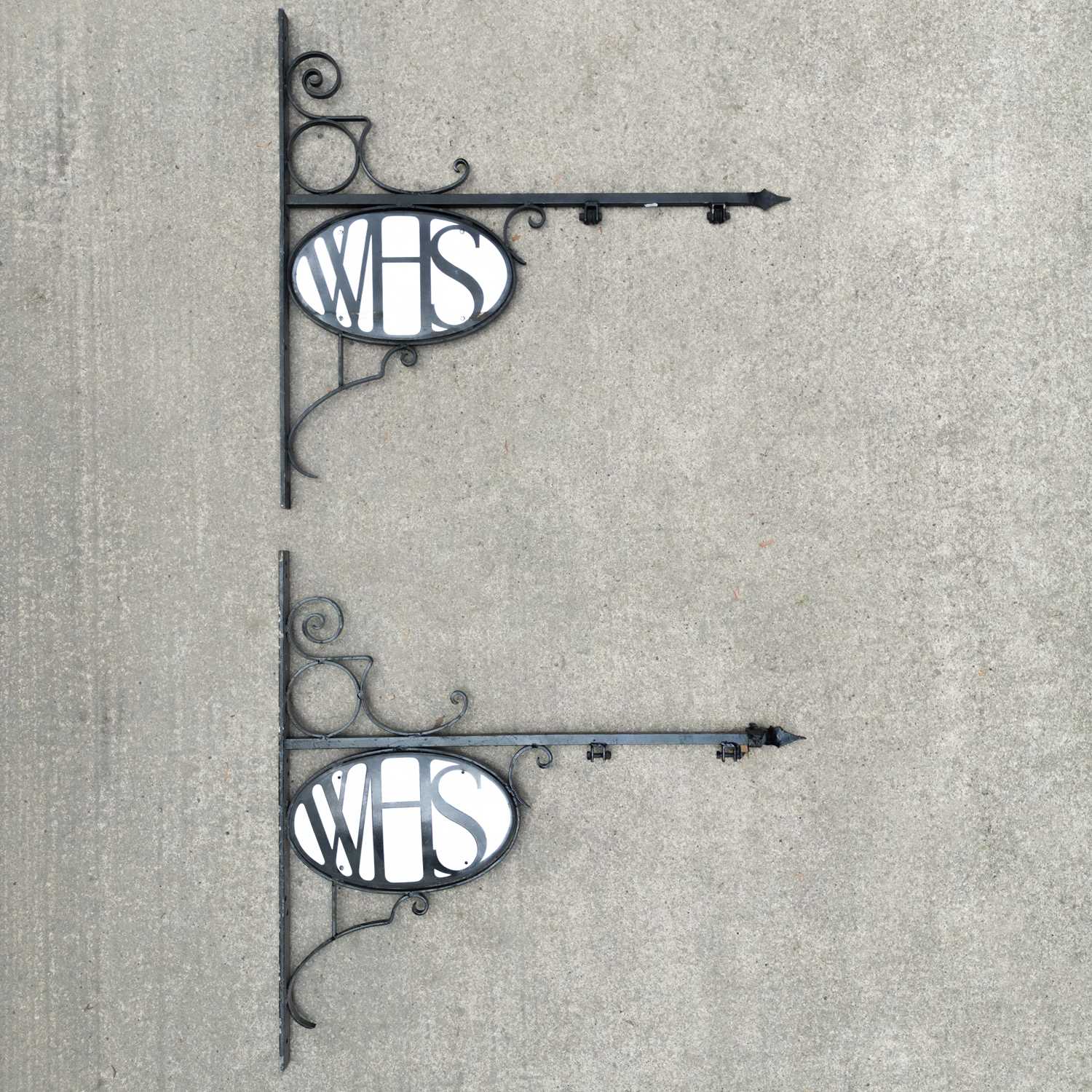 Lot 45 - A near pair of W. H. Smith wrought iron brackets