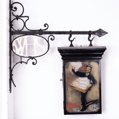 Lot 32 - A W. H. Smith Newsboy advertising sign