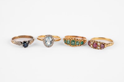 Lot 271 - Four yellow metal gem set dress rings