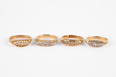 Lot 272 - Four yellow metal and diamond rings