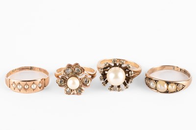 Lot 278 - Four yellow metal and pearl rings